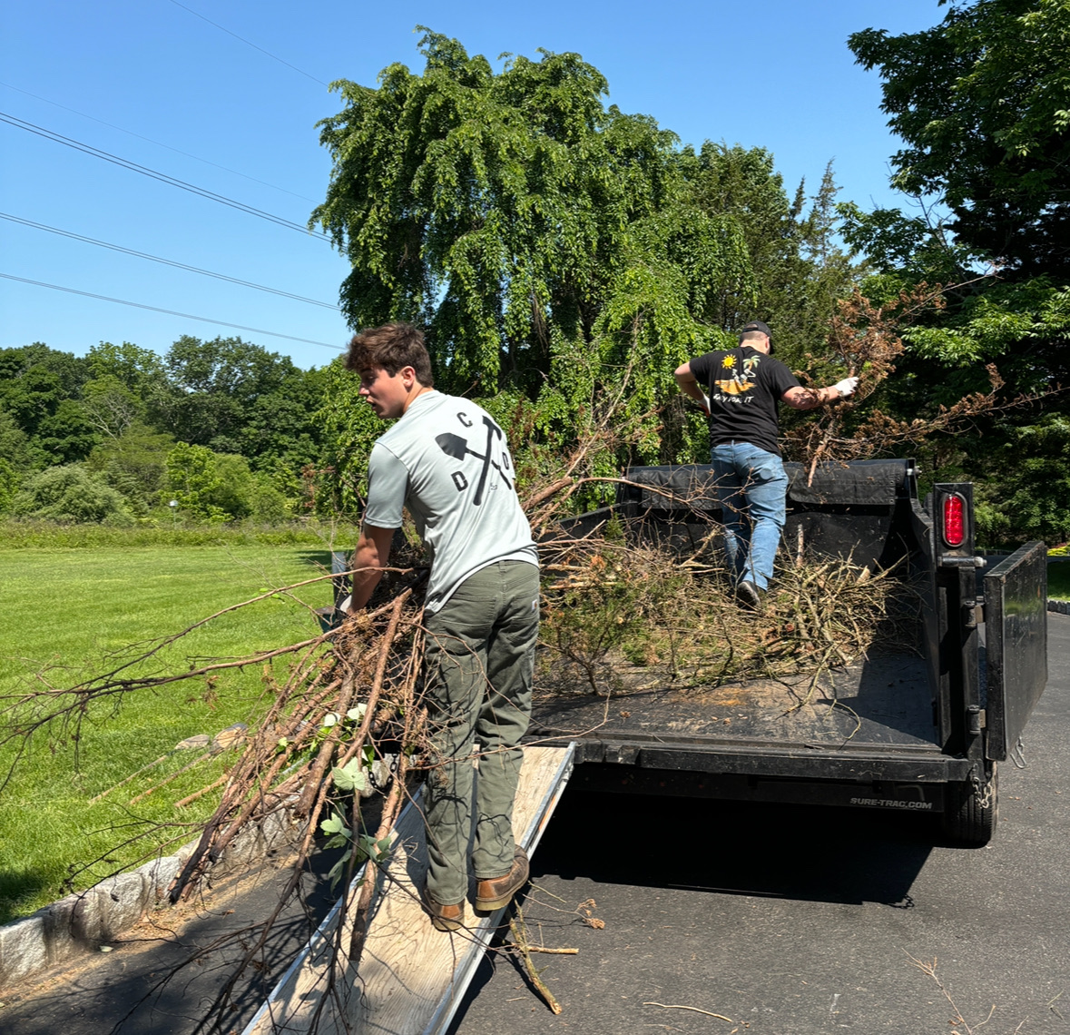 DCD Laborers hauling brush